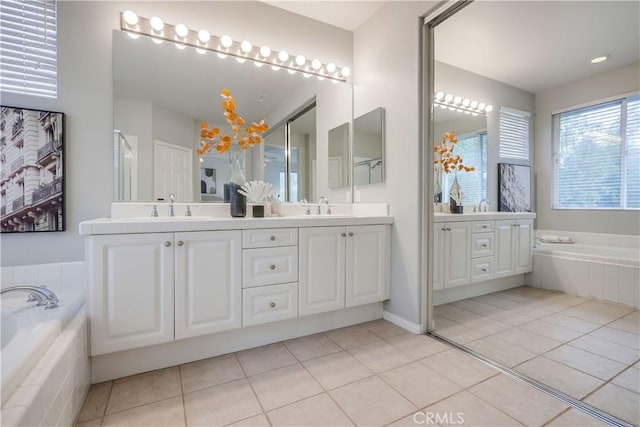 30 Oakhurst Rd, Irvine, CA 92620 - full bathroom featuring double vanity, a garden tub, and tile patterned flooring