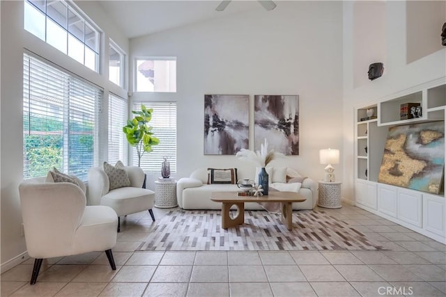 30 Oakhurst Rd, Irvine, CA 92620 - living room featuring high vaulted ceiling, light tile patterned floors, built in shelves, and a ceiling fan