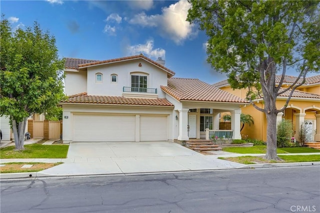 30 Oakhurst Rd, Irvine, CA 92620 - mediterranean / spanish-style home featuring stucco siding, concrete driveway, a tile roof, a porch, and an attached garage