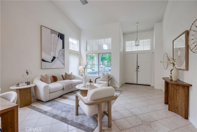 30 Oakhurst Rd, Irvine, CA 92620 - living area featuring light tile patterned floors and a high ceiling