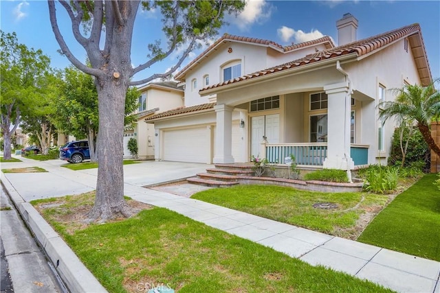 30 Oakhurst Rd, Irvine, CA 92620 - mediterranean / spanish home featuring covered porch, driveway, a chimney, a garage, and stucco siding