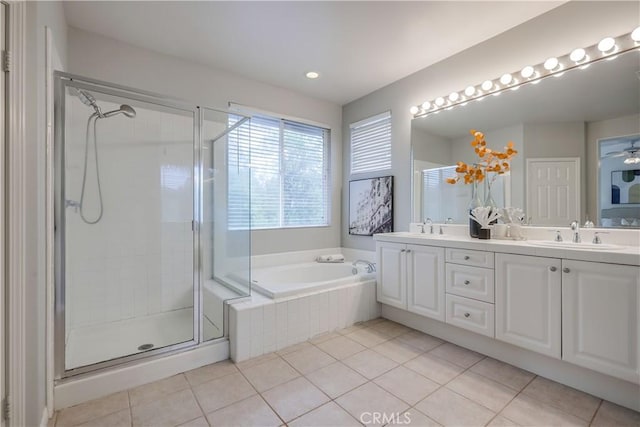 30 Oakhurst Rd, Irvine, CA 92620 - bathroom featuring double vanity, a bath, a shower stall, tile patterned floors, and recessed lighting