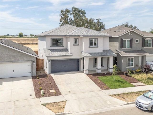 68 Sedona Dr, Merced, CA 95341 - view of front of property featuring stucco siding, concrete driveway, a shingled roof, covered porch, and a garage