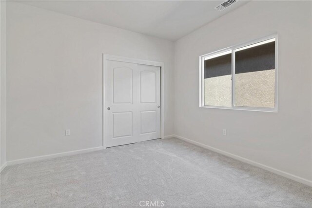 68 Sedona Dr, Merced, CA 95341 - unfurnished bedroom featuring carpet flooring, baseboards, and a closet