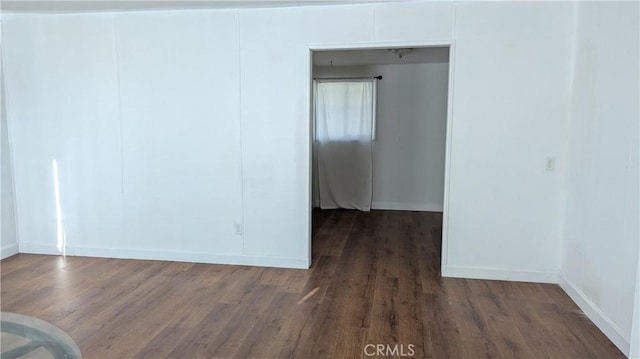 6445 Pony Rd, Johnson Valley, CA 92285 - empty room featuring dark wood-style flooring and baseboards