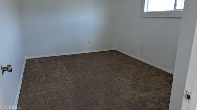 6445 Pony Rd, Johnson Valley, CA 92285 - carpeted empty room with baseboards