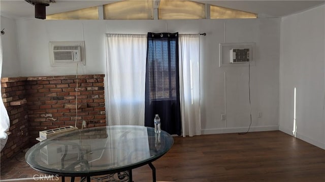 6445 Pony Rd, Johnson Valley, CA 92285 - dining area featuring wood finished floors, an AC wall unit, and baseboards