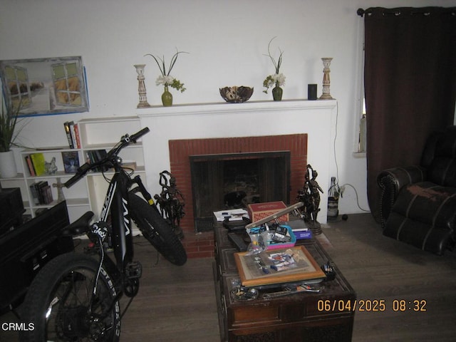 542 1st St, Fillmore, CA 93015 - living area with wood finished floors and a fireplace