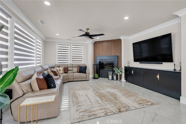 30195 Corte Coelho, Temecula, CA 92591 - living room featuring ornamental molding, ceiling fan, recessed lighting, marble finish flooring, and a large fireplace