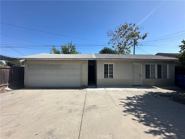 942 E 6th St, Pomona, CA 91766 - ranch-style house featuring a shingled roof and a garage