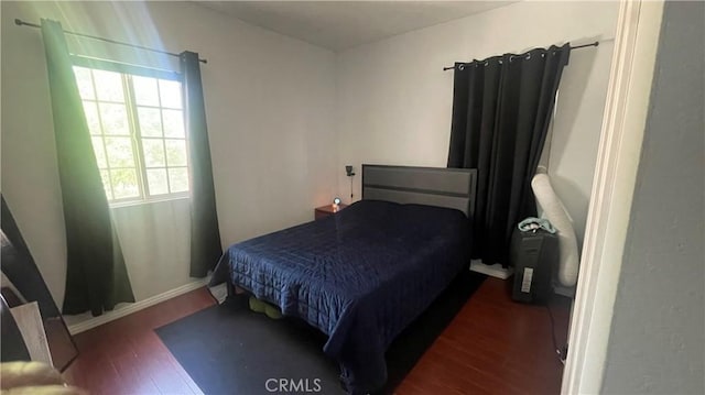 942 E 6th St, Pomona, CA 91766 - bedroom with wood finished floors
