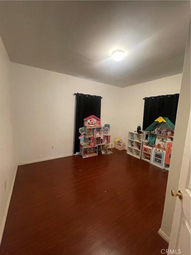 942 E 6th St, Pomona, CA 91766 - rec room with wood finished floors and baseboards