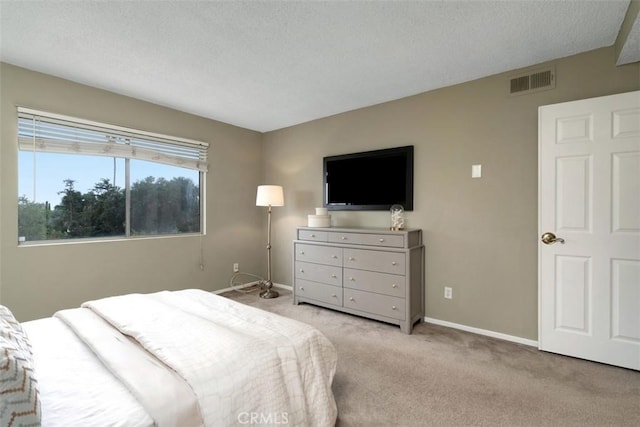 972 E California Blvd Unit 309, Pasadena, CA 91106 - bedroom featuring light carpet and a textured ceiling