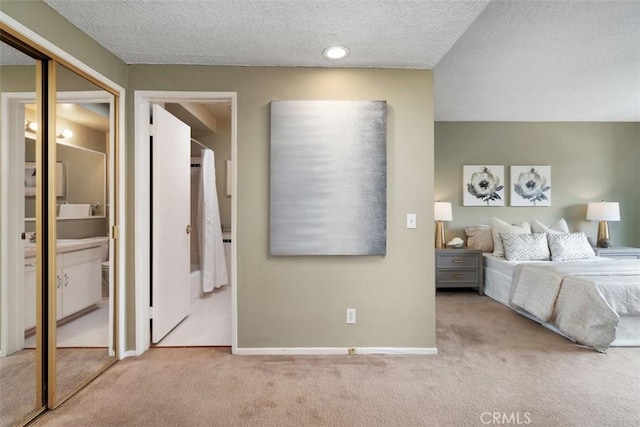 972 E California Blvd Unit 309, Pasadena, CA 91106 - carpeted bedroom with a textured ceiling and baseboards