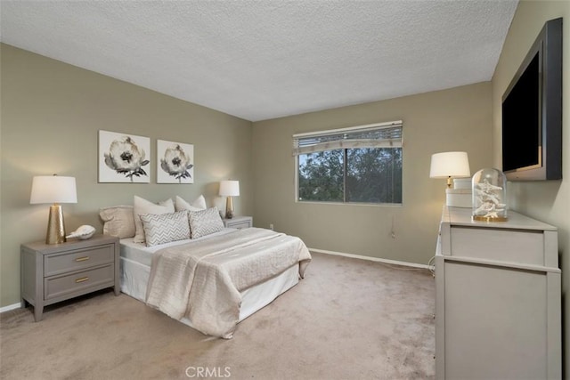 972 E California Blvd Unit 309, Pasadena, CA 91106 - bedroom featuring light carpet and a textured ceiling