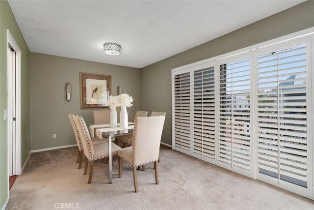 972 E California Blvd Unit 309, Pasadena, CA 91106 - dining area with carpet floors and baseboards