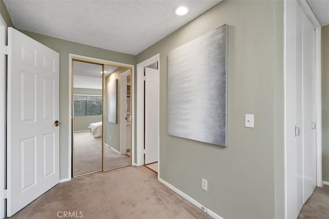 972 E California Blvd Unit 309, Pasadena, CA 91106 - hallway featuring carpet, a textured ceiling, and recessed lighting