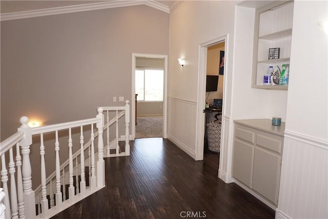 2622 Presidio Ln, Corona, CA 92879 - hall with an upstairs landing, crown molding, dark wood finished floors, and a wainscoted wall