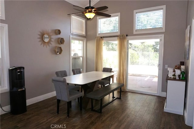 2622 Presidio Ln, Corona, CA 92879 - dining area with dark wood-style flooring, a high ceiling, and a ceiling fan