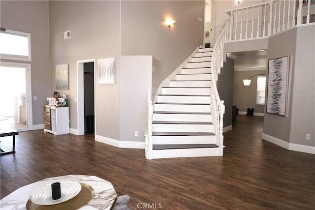 2622 Presidio Ln, Corona, CA 92879 - unfurnished living room with a high ceiling, stairway, and wood finished floors