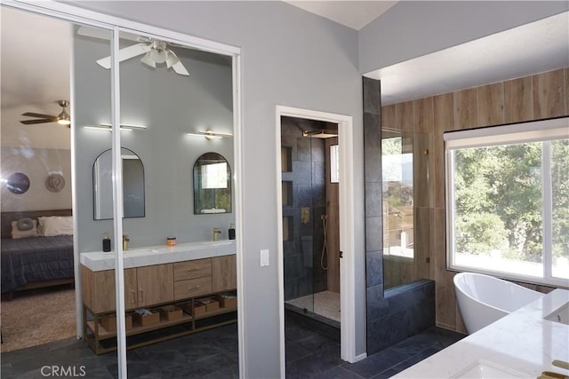 2622 Presidio Ln, Corona, CA 92879 - bathroom with double vanity, ceiling fan, connected bathroom, and a freestanding tub