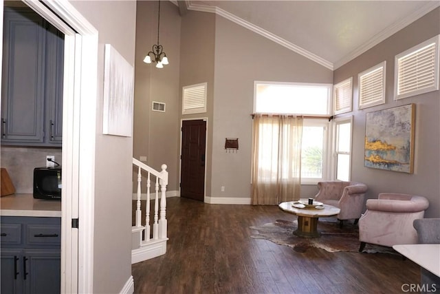 2622 Presidio Ln, Corona, CA 92879 - living room featuring dark wood finished floors, high vaulted ceiling, stairway, a chandelier, and ornamental molding