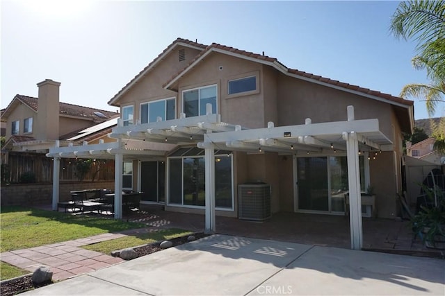 2622 Presidio Ln, Corona, CA 92879 - rear view of property featuring a pergola, a patio area, stucco siding, and a tile roof