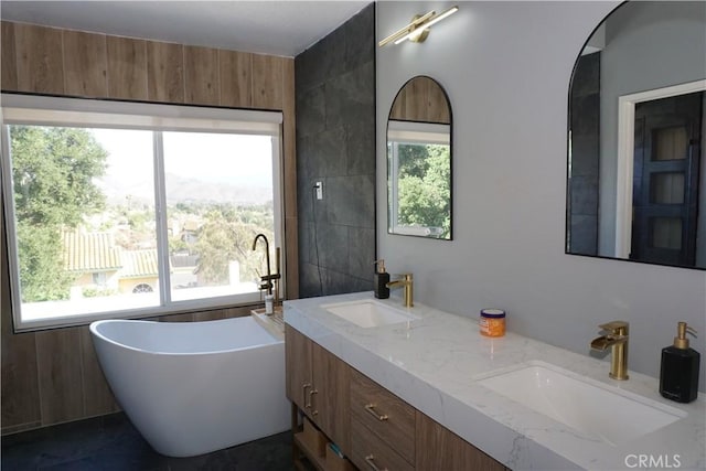 2622 Presidio Ln, Corona, CA 92879 - full bathroom featuring double vanity, a freestanding bath, and tile walls