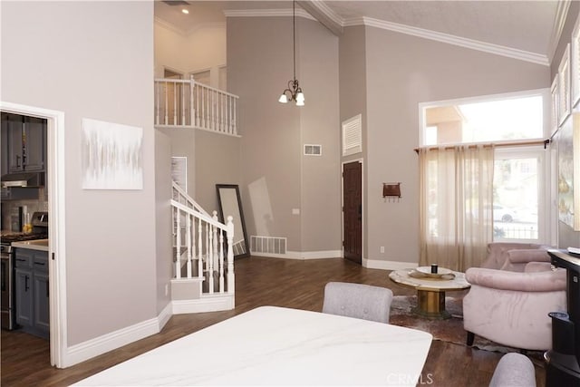 2622 Presidio Ln, Corona, CA 92879 - interior space featuring high vaulted ceiling, dark wood-style flooring, stairs, a chandelier, and ornamental molding