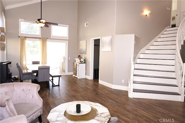 2622 Presidio Ln, Corona, CA 92879 - living room with ceiling fan, stairway, high vaulted ceiling, wood finished floors, and crown molding