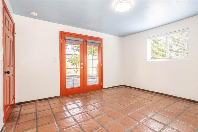 7343 Owensmouth Ave, Canoga Park, CA 91303 - empty room with french doors and baseboards
