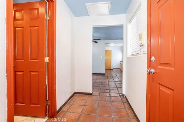 7343 Owensmouth Ave, Canoga Park, CA 91303 - hall with baseboards and tile patterned floors