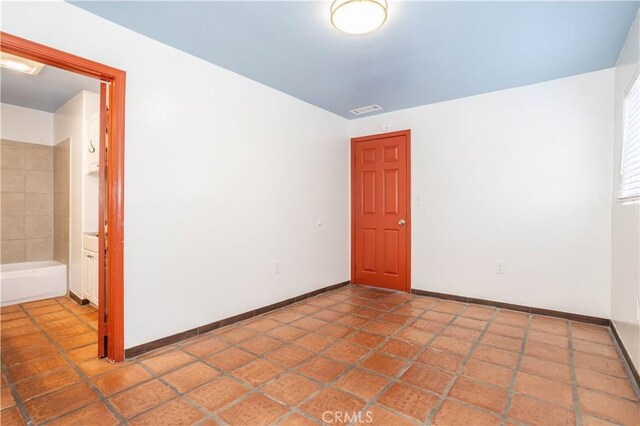 7343 Owensmouth Ave, Canoga Park, CA 91303 - spare room featuring baseboards
