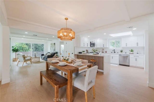 1304 Walling Ave, Brea, CA 92821 - dining room with beamed ceiling, light wood-style floors, a chandelier, and recessed lighting