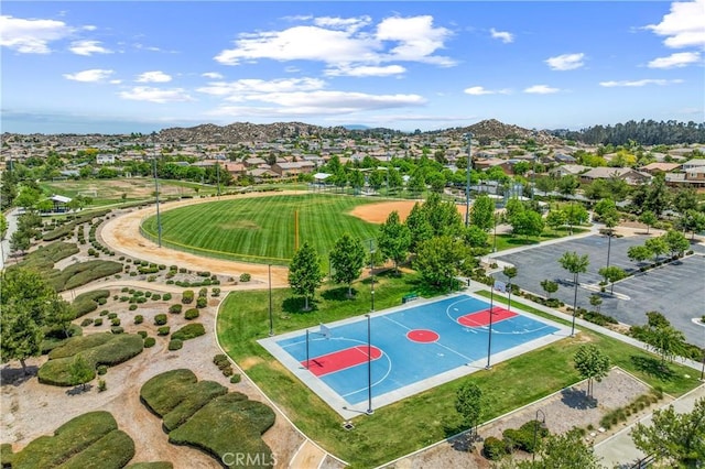 30574 Saddlehorn Way, Menifee, CA 92584 - view of basketball court featuring community basketball court, a residential view, and a mountain view