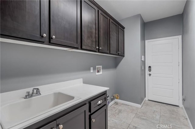 30574 Saddlehorn Way, Menifee, CA 92584 - laundry area featuring cabinet space and washer hookup