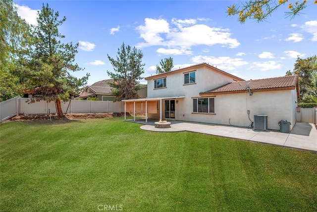 30574 Saddlehorn Way, Menifee, CA 92584 - rear view of property with a patio area, a fenced backyard, and an outdoor fire pit