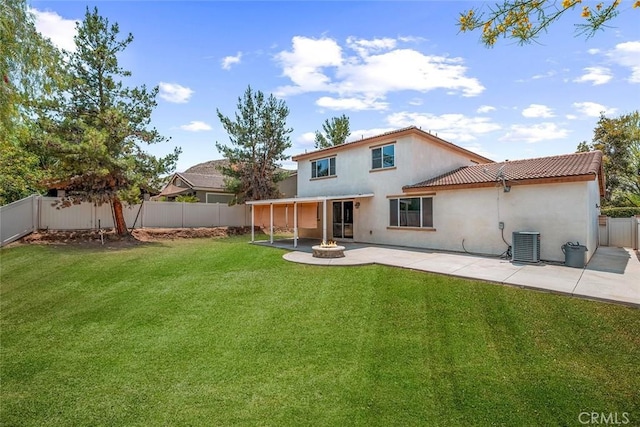 30574 Saddlehorn Way, Menifee, CA 92584 - rear view of house featuring a patio area, a fenced backyard, and a fire pit