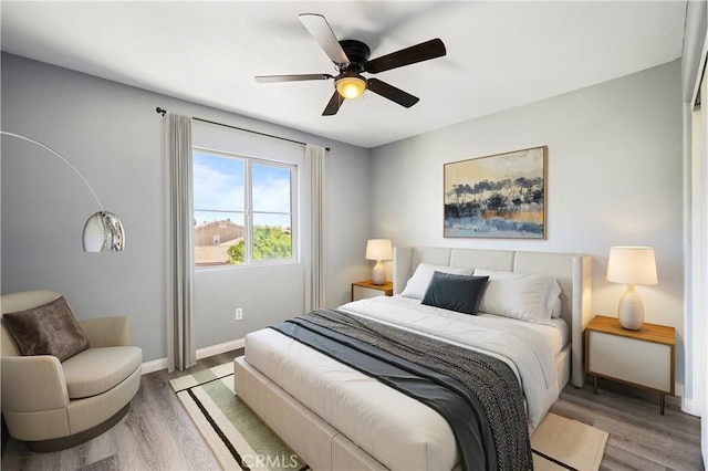 30574 Saddlehorn Way, Menifee, CA 92584 - bedroom featuring wood finished floors and ceiling fan