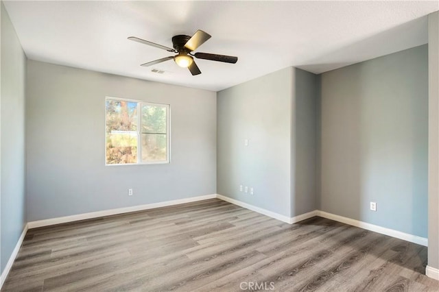 30574 Saddlehorn Way, Menifee, CA 92584 - spare room with a ceiling fan and wood finished floors