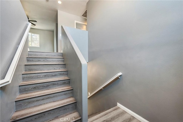 30574 Saddlehorn Way, Menifee, CA 92584 - stairs featuring wood finished floors and baseboards