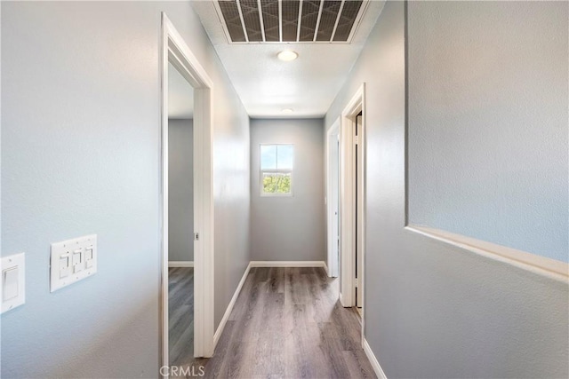 30574 Saddlehorn Way, Menifee, CA 92584 - hall with wood finished floors and baseboards