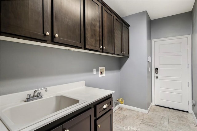 30574 Saddlehorn Way, Menifee, CA 92584 - washroom featuring cabinet space and washer hookup