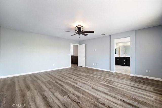 30574 Saddlehorn Way, Menifee, CA 92584 - empty room featuring wood finished floors and ceiling fan