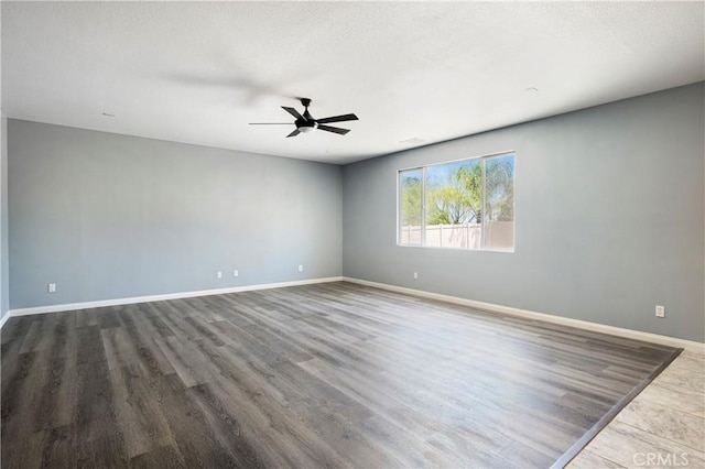 30574 Saddlehorn Way, Menifee, CA 92584 - empty room with ceiling fan, wood finished floors, and a textured ceiling