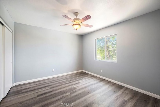 30574 Saddlehorn Way, Menifee, CA 92584 - empty room with wood finished floors and ceiling fan