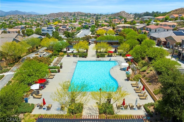 30574 Saddlehorn Way, Menifee, CA 92584 - community pool featuring a residential view and a mountain view