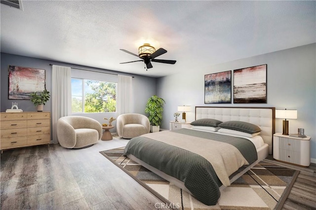 30574 Saddlehorn Way, Menifee, CA 92584 - bedroom with wood finished floors and ceiling fan