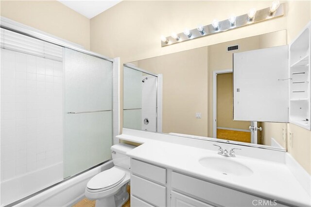 221 Grand Oaks Dr, Glendora, CA 91741 - bathroom with vanity, toilet, and combined bath / shower with glass door