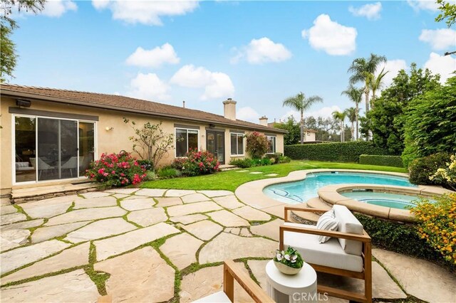 221 Grand Oaks Dr, Glendora, CA 91741 - view of pool with an in-ground hot tub, a patio, and a lawn